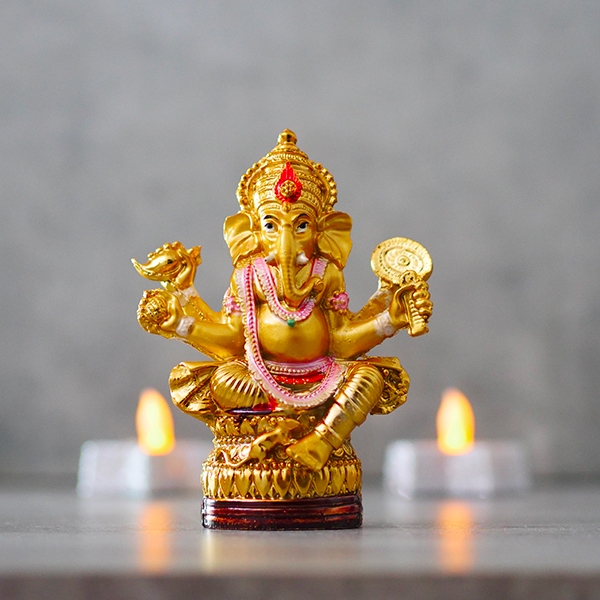 Indian hindu god Ganesh golden statue for temple